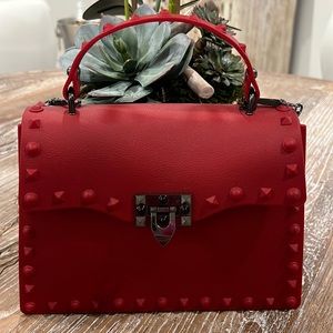Red studded jelly handbag